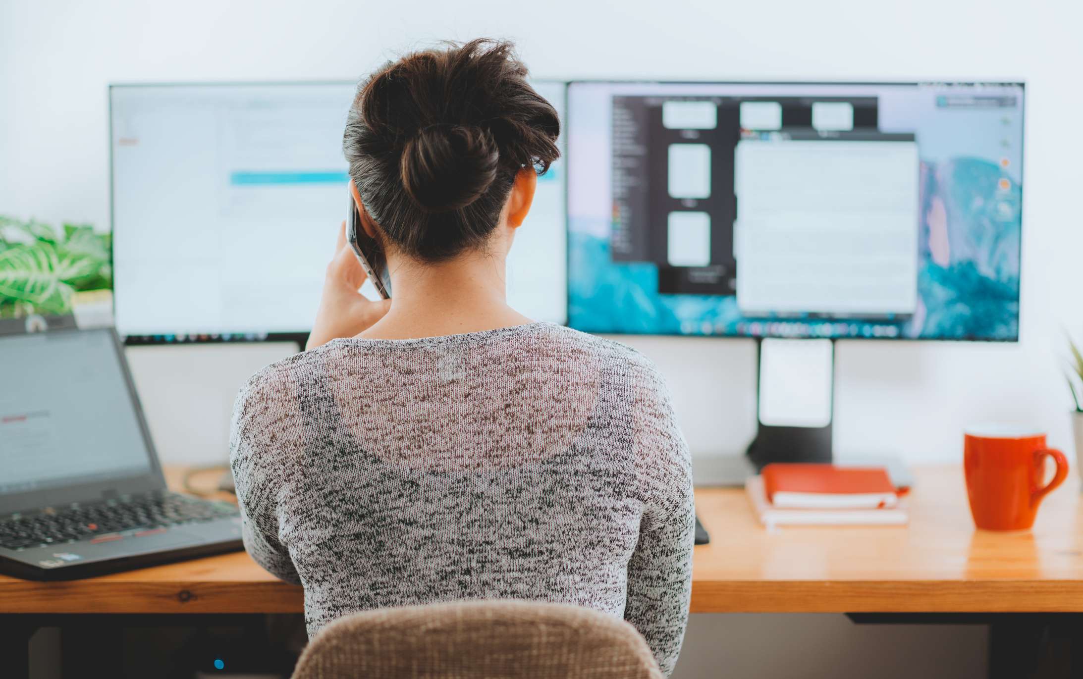 Woman on laptop working remotely