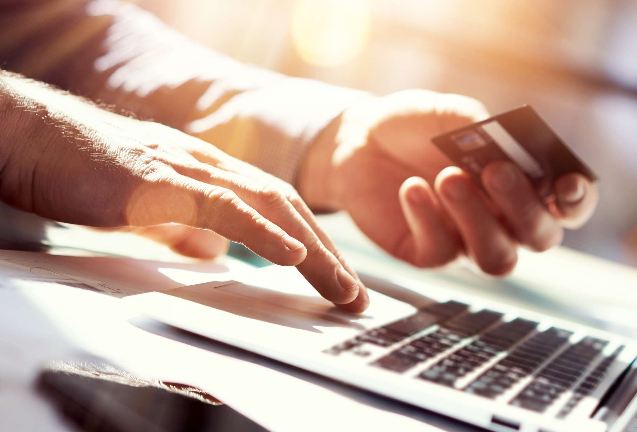 Man shopping online from laptop